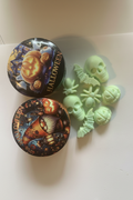 Pale supernatural green Halloween tin of Pear-anormal sweet and spiced pear soy wax melts
